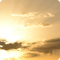 a person with a sunset in the background