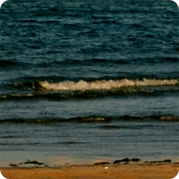 a body of water next to the ocean