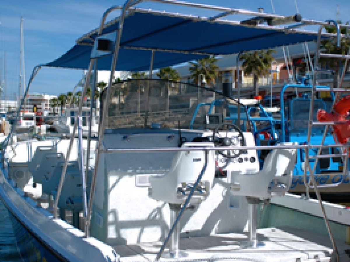 a boat docked at a dock