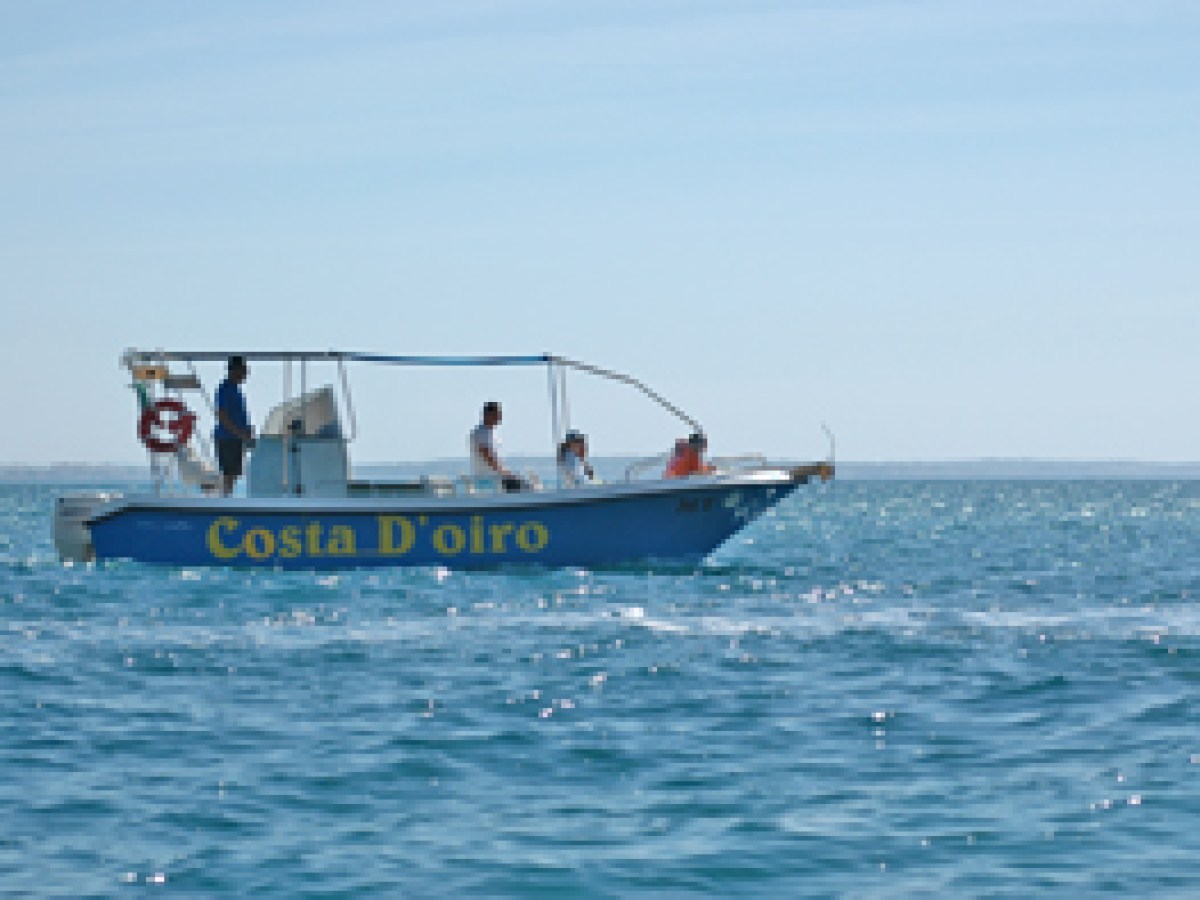 a small boat in a body of water