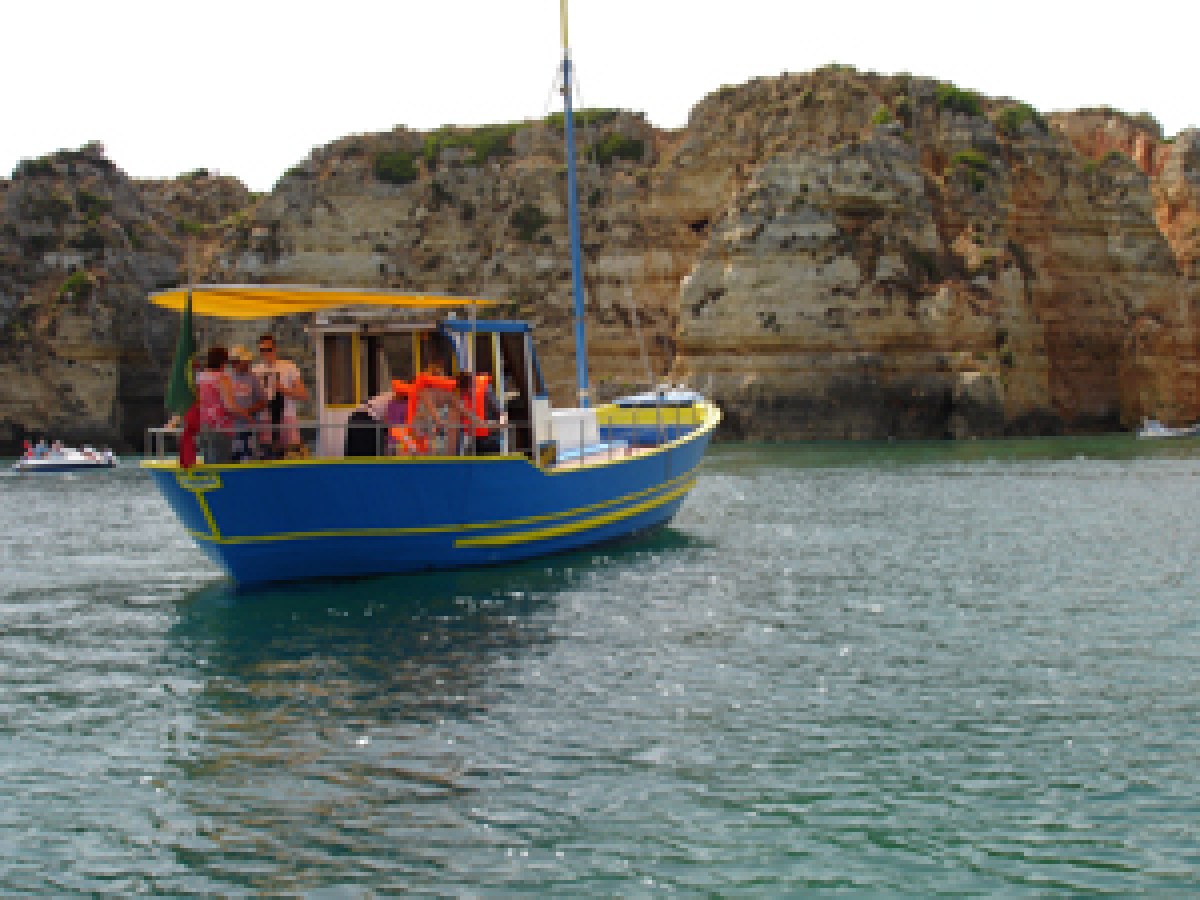 a small boat in a body of water