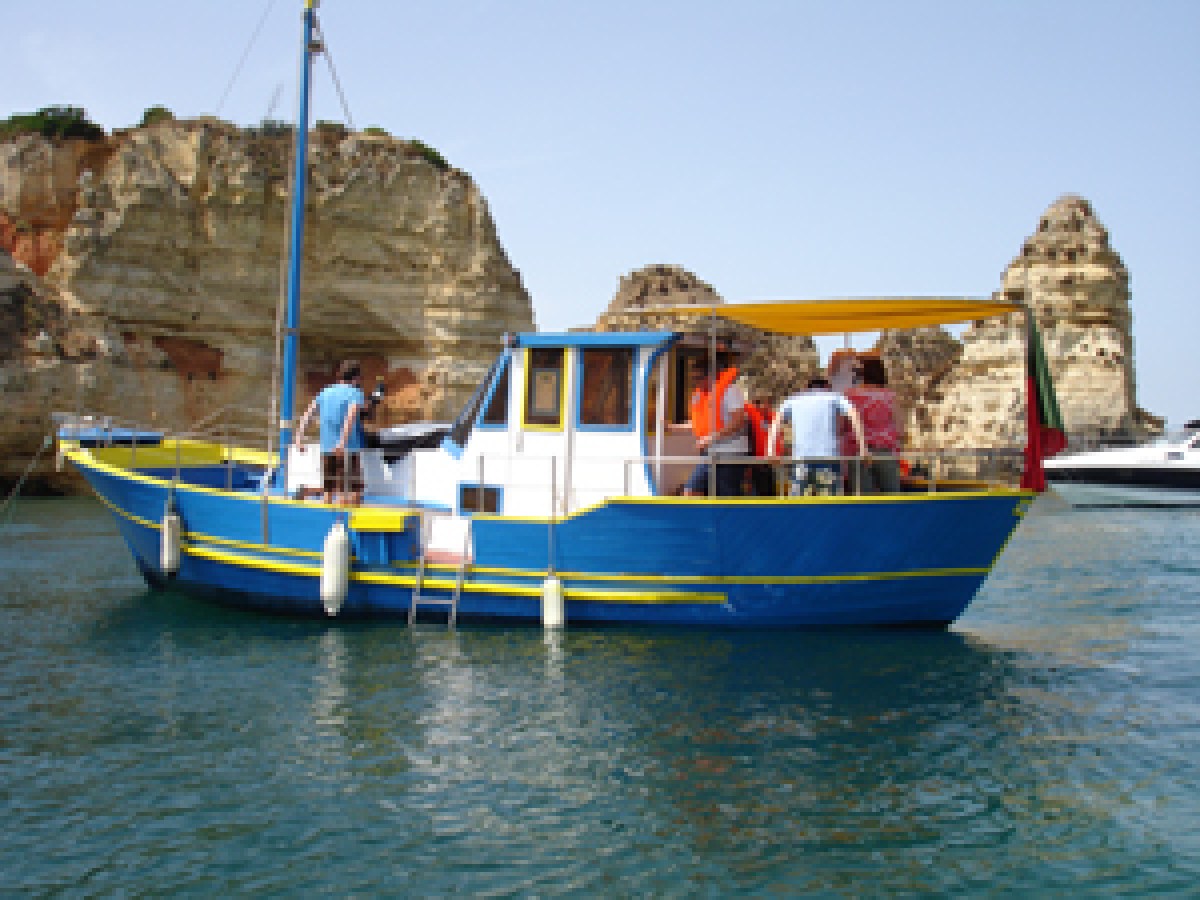 a small boat in a body of water