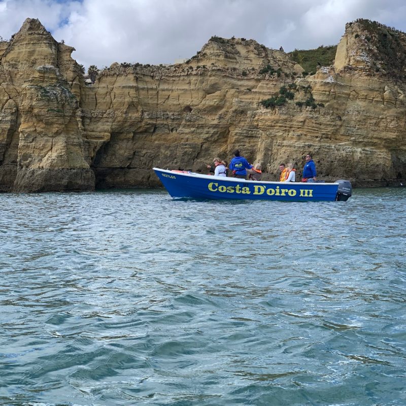 a small boat in a body of water