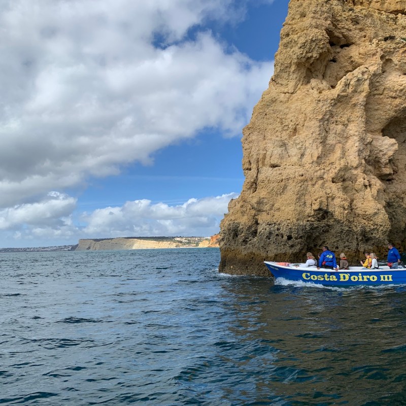 a small boat in a body of water