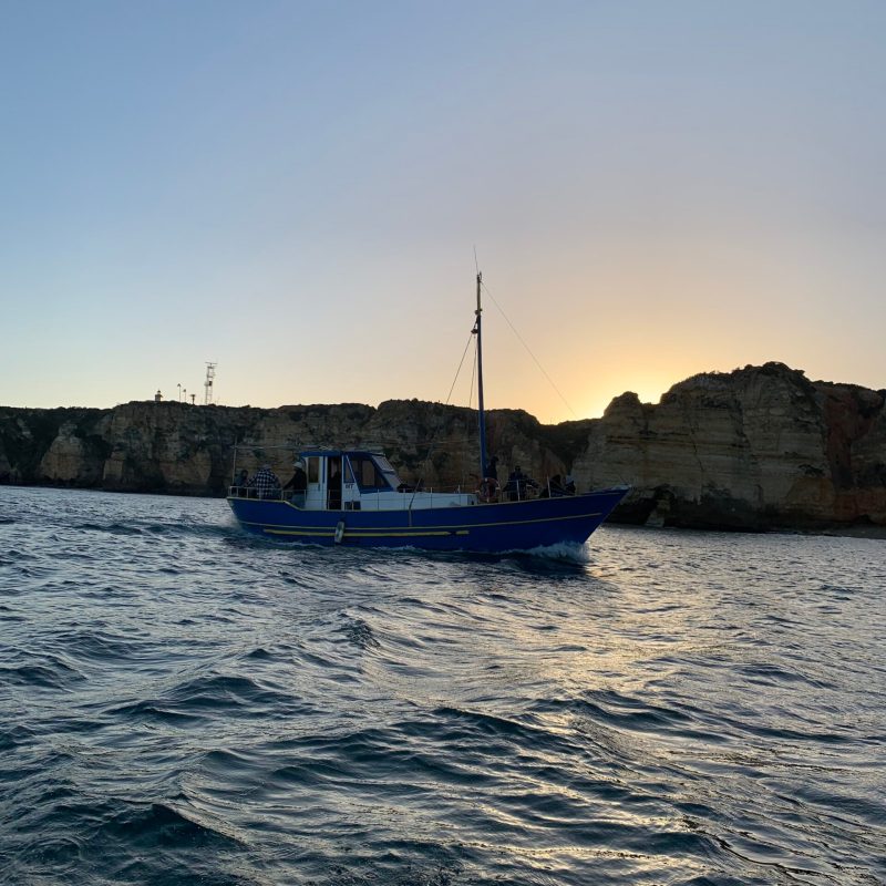 a small boat in a body of water